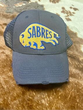 NWT Men’s Buffalo Sabres Trucker Hat- distressed; Labatt Blue logo- One size